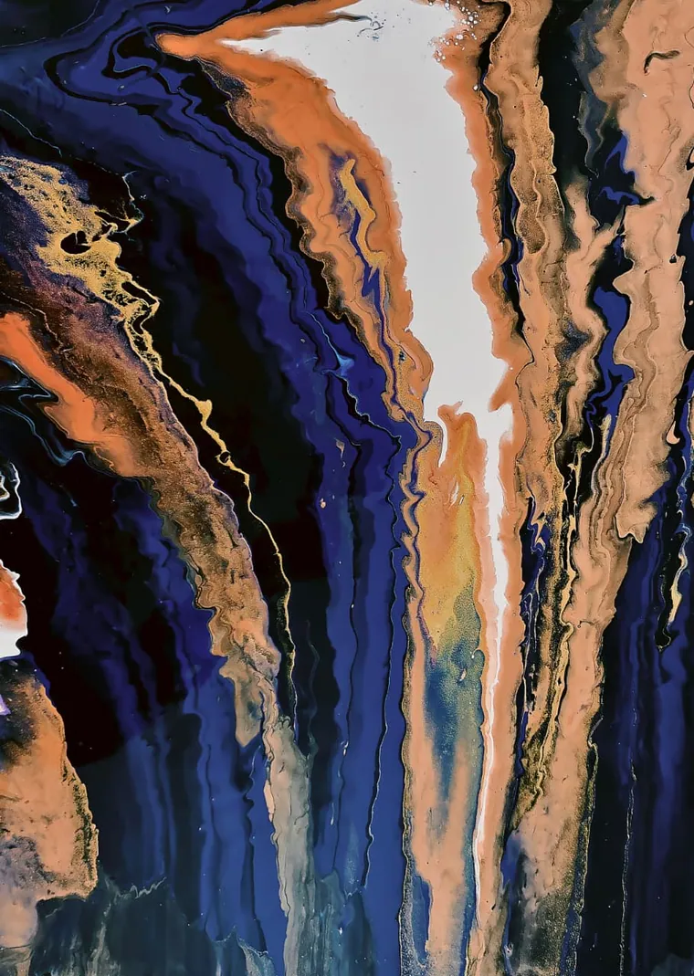A vertical acrylic pour: a channel of white and peach runs down through walls of indigo, blue and black veined with gold, like light falling into a canyon.