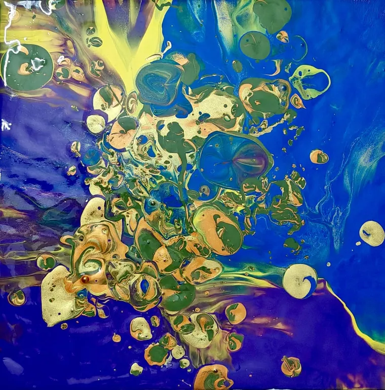 Green and gold cellular blooms scattered across a cobalt-blue poured ground.