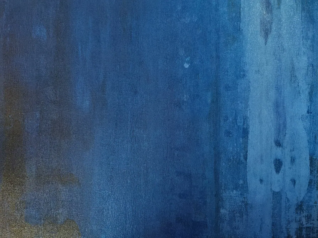A Rothko-like colour field of layered deep blues with a soft gold edge at the left and a luminous paler band toward the right.