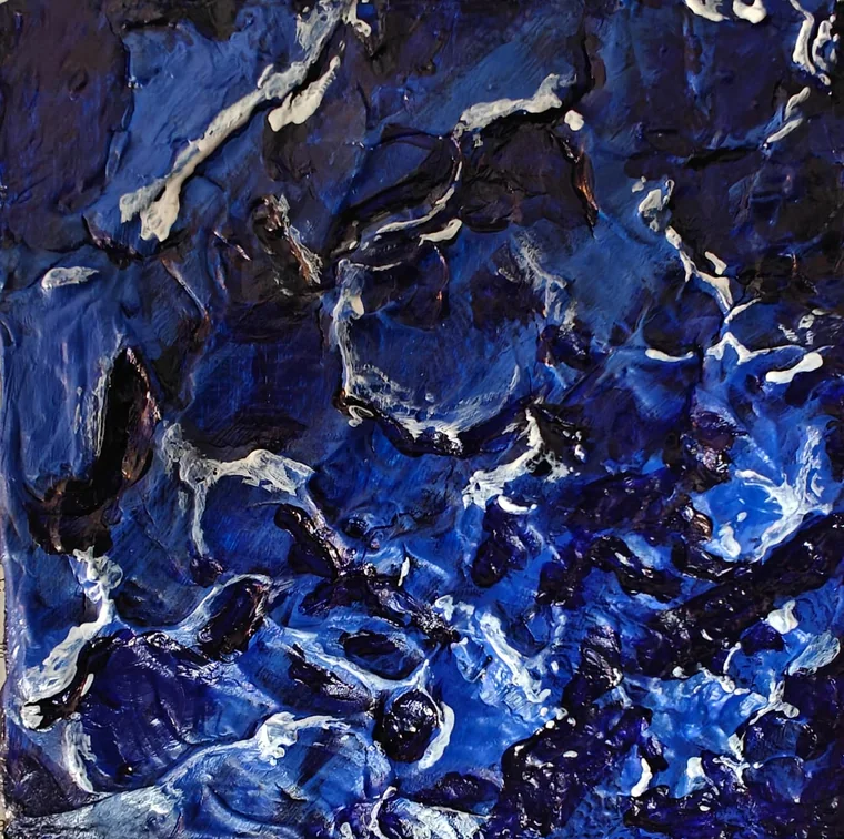A three-dimensional relief painting of a turbulent sea: thick sculpted ridges of cobalt and ultramarine blue with white foam crests and dark troughs, the pigment built up off the surface.