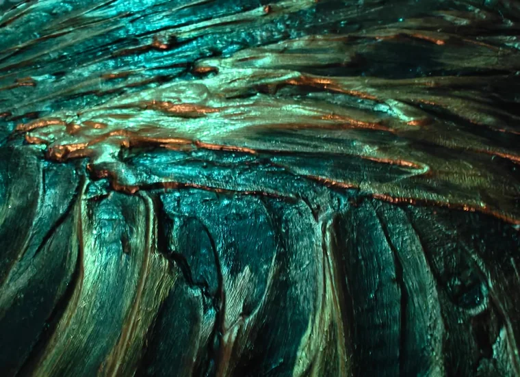 The same swirling sculptural relief lit in teal and jade green, with copper highlights catching along the raised crests of paint.