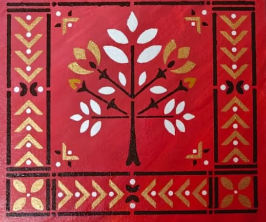 A folk tree-of-life motif in white and gold leaves on a red ground with a patterned border.