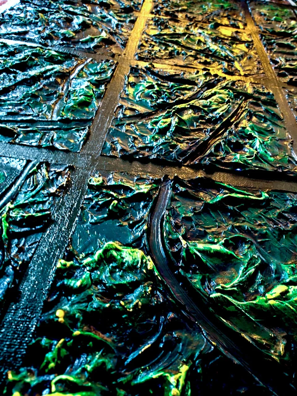 A thick relief painting in dark green and black acrylic paste with lime and gold highlights, crossed by flat bars that divide it into panes, lit from the side so the ridges cast shadows.