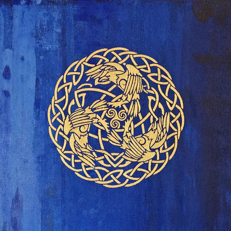 A gold Celtic knotwork roundel of three interlaced cranes around a central triple spiral, on a deep blue ground.